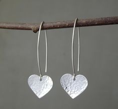 "Simple yet stylish long sterling silver dangle earrings featuring a beautiful hand hammered heart. They will add a lovely touch to any outfit and will make an ideal birthday or anniversary gift. Dimensions: Total length: approximately 4.3 cm (1.6\") Heart: 1.5 cm (0.5\") x 1.3 cm (0.5\") Metal: High quality 925 sterling silver The earrings will come in a beautiful gift box. * CHECK OUT MORE JEWELLERY * www.etsy.com/shop/kailajewellery" Simple Silver Earrings Heart, Cold Connections, Jewellery Workshop, Simple Silver Earrings, Silver Smithing, Modern Silver Jewelry, Jewelry Making Classes, Handmade Silver Jewellery, Silver Clay