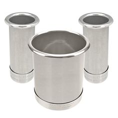 two stainless steel cups sitting next to each other