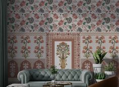 a living room scene with focus on the couches and wall papered in floral designs