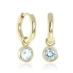 Since 1861, Gump's has been a destination for jewelry that is distinctive and timeless. To ensure each piece is created to our exacting standards, our expert in-house jewelry team oversees every step of the production process. The result is a statement of pure elegance. Aquamarine, 0.90ctw. 14-karat yellow gold. Pierced only. 3/4" long. Timeless Huggie Earrings, Elegant Formal Huggie Earrings With Gemstone, Elegant Gemstone Huggie Earrings For Formal Occasions, Elegant Gemstone Huggie Earrings For Formal Events, Timeless Round Huggie Earrings With Polished Finish, Fine Jewelry Gemstone Hoop Earrings For Formal Occasions, Fine Jewelry Hoop Earrings With Gemstones For Formal Events, Formal Fine Jewelry Huggie Earrings With Gemstones, Elegant Round Huggie Earrings With Bezel Setting