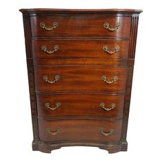 an antique chest of drawers with brass hardware on the top and bottom, in walnut wood