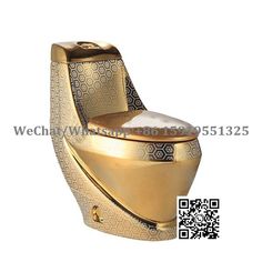 a gold toilet sitting on top of a white floor next to a qr code