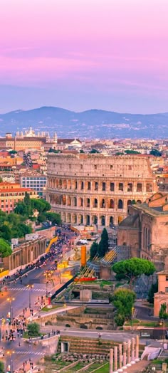 an aerial view of the roman colossion in rome, italy at sunset or dawn