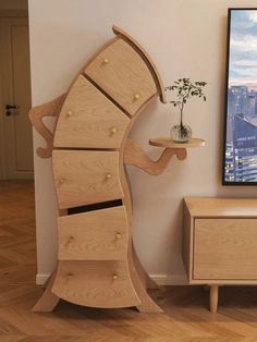 an unusual wooden shelf in the corner of a room with a painting on the wall