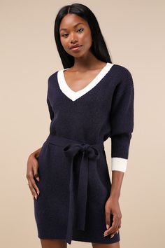 Stay cute all season long in the Lulus Cuddly Forecast Navy Long Sleeve Belted Sweater Mini Dress! Soft and chunky sweater knit shapes this effortless dress that has long sleeves with drop shoulders and a V-neckline. Relaxed-fit bodice has a removable sash belt, atop a figure-skimming mini skirt. White-toned ribbed knit accents the neckline and cuffs. Fit: This garment fits true to size. Length: Mid-thigh. Size medium measures 33" from shoulder to hem. Bust: Great for any cup size. Waist: Loosel Fall Sweater Dress, Sweater Mini Dress, Belted Sweater, Blue Dress Casual, Sash Belt, Mini Sweater Dress, Mini Dress Casual, Skirt White, Chunky Sweater