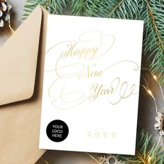 a card with the words happy new year written on it next to some christmas decorations