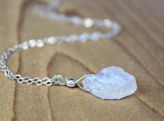 "SIZE XS and S are currently on sale at a separate listing. https://www.etsy.com/ThreeMagicGenies/listing/830987448/petite-raw-moonstone-necklace-june?utm_source=Copy&utm_medium=ListingManager&utm_campaign=Share&utm_term=so.lmsm&share_time=1595783435581 - THIS LISTING IS FOR ONE NECKLACE. PHOTOS ARE ENLARGED. (Please refer to the last few photos for the actual size). - Made with AAA+ quality rough stone with rainbow or blue flash. All stones are carefully selected. - The stones a Raw Moonstone Necklace, Moonstone Necklaces, Crystal Jewelry Necklaces, Ethereal Jewelry, Raw Moonstone, Moonstone Pendant Necklace, Rainbow Moonstone Necklace, Pacific Palisades