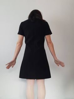 Made under request! Handmade dress in soft wool with lining 90%polyester 2%elastan 8%viscose Color: Black You can see here an example on a coat from the fabric https://www.etsy.com/listing/206734254/mod-wool-coat-60s-retro-soft-light-blue?ref=shop_home_active_1 You can choose your own measurements, length. Special request are easy, just add this listing to your cart https://www.etsy.com/listing/624364219/special-requests?ref=shop_home_active_25 If you want it on a rush you have priority shipping Black Wool Dress, 60s Mini Dress, 60s Women, Custom Made Dress, 60s Retro, Made Dress, 1960's Dress, Dress Winter, Handmade Dress