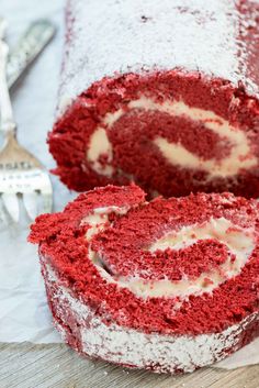 a close up of a cake roll on a plate