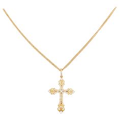 This gorgeous, intricate diamond cross pendant is a stunning and striking design. The cross pendant is made in 18 karat yellow gold with genuine, natural diamonds. The cross design has handmade beading and milgrain texture that balances the pave diamonds set on top. The cross has a bail that also has diamonds pave set across the top! This pendant is on an 18 inch cable chain that compliments the cross pendant perfectly. 18 Karat Yellow Gold 0.32 carat total diamond weight, VS-2 clarity, G-H colo Luxury Fine Jewelry Cross Necklace, Luxury Cross Jewelry With Pave Setting, Luxury Cross Pendant Jewelry With Pave Setting, Luxury Diamond Accents Cross Necklace, Classic Luxury Yellow Gold Cross Necklace, Luxury Yellow Gold Cross Necklace, Luxury Pendant Cross Necklace With Diamond Accents, Luxury Cross Necklace With Diamond Accents, Luxury Cross Pendant Necklace With Diamond Accents