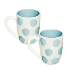 two coffee mugs with blue spots on them