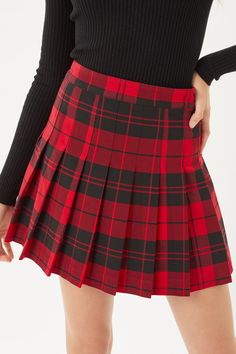 Pleated Mini Skirt For Winter, Winter Pleated Fitted Mini Skirt, School Tennis Skirt For Fall, Fitted Winter Skort With Pleated Skirt, Fall Skirted Skort For School, Winter Stretch Lined Skort, Plaid Skirted Skort For Fall, Winter School Pleated Skirt, Winter Skort For School