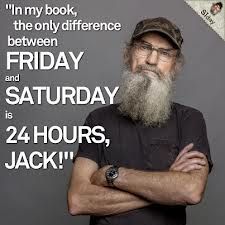 a man with a long beard standing in front of a sign that says, i'm my book the only reference between friday and saturday is 24 hours, jack