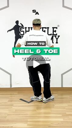 a man holding a sign that says how to heel and toe