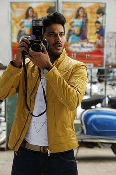 a man taking a photo with his camera