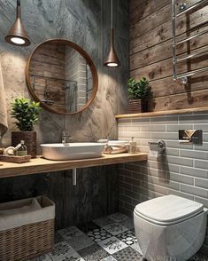 a bathroom with a toilet, sink and mirror on the wall next to tiled floor