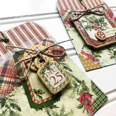 three tags with christmas designs on them