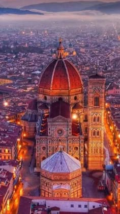 an aerial view of a city at night