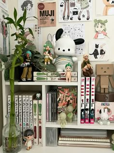 there is a shelf with many books and figurines on it in the room