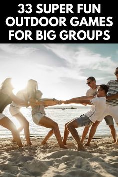 a group of people holding hands on the beach with text overlay that reads 33 super fun outdoor games for big groups