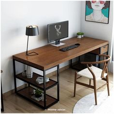 a wooden desk with a computer on it