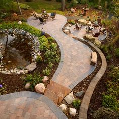 an outdoor patio and fire pit in a backyard