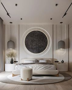 a modern bedroom with circular bed and round rug on the floor in front of it