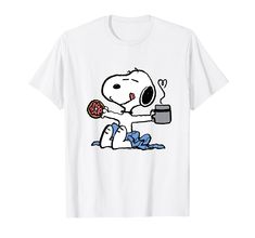 a snoopy holding a donut and pouring milk on it with his tongue out t - shirt