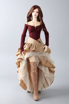 a mannequin dressed in a dress and boots