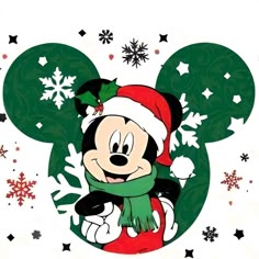 mickey mouse wearing a santa hat and scarf with snowflakes on the ground behind him