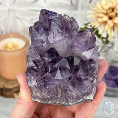 This mesmerizing Brazilian purple Amethyst is a true gemstone that boasts a rich violet hue accompanied by facets that sparkle in the light. The golden goethite inclusions within this gem create a unique, enchanting pattern. Approximate Size:L: 3.40" x W: 3.00" x H: 2.90"Approximate Weight:1.10 lbs. We make and carry many unique and one-of-a-kind items made of materials from around the world. Some may come with imperfections because they're natural. Appearances of cracks and chips aren't due to Lavender Gemstone Crystals For Spiritual Use, Lavender Healing Gemstone Crystals, Spiritual Purple Gemstones As A Gift, Purple Amethyst Gemstone Crystals, Spiritual Amethyst Crystals, Large Purple Stone Crystal As Gift, Lavender Amethyst Gemstone Crystals, Spiritual Lavender Crystals, Large Purple Stone Crystals As Gift