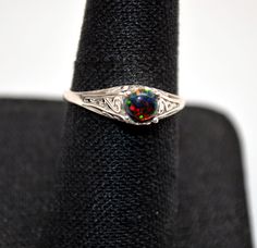 Beautiful Black Opal ring in Sterling Silver Filigree Setting, Size 7 Black Oval Opal Ring For Formal Occasions, Black Filigree Ring With Intricate Design, Black Filigree Ring For Formal Occasions, Formal Black Filigree Ring, Classic Black Filigree Rings, Black Filigree Rings For Anniversary, Formal Black Opal Ring, Formal Black Ring With Filigree Detailing, Elegant Black Opal Ring As Gift