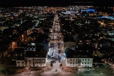 an aerial view of a city at night