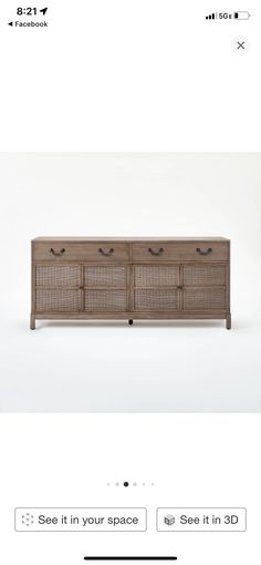 the sideboard is made out of wood and has two drawers on each side, one with