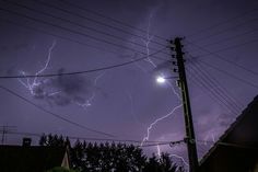 the sky is full of lightning and it appears to be overcast