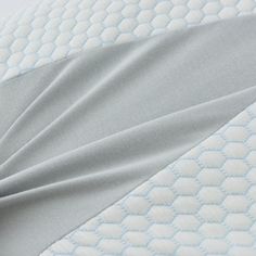 a close up view of the side of a mattress that has been made into a pillow