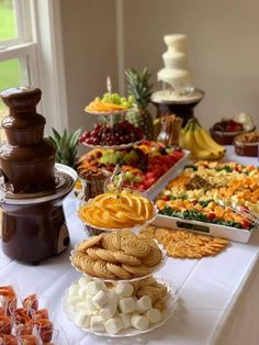 an assortment of desserts and snacks on a table