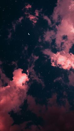 the night sky is full of stars and clouds, as well as a half moon