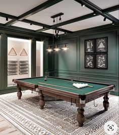 a pool table in the middle of a room