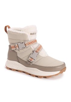 Nothing says warmth, style and comfort like MUK LUKS Women's Wren Boots in the winter. You'll get a fashionable upgrade from the quilted nylon hi-top, faux-fur lining, metal taping and stitching details throughout. Pull on these boots and envelop your feet in warmth thanks to the signature Muk Luxe lining and Memory foam.100% Polyurethane Upper100% Polyester Lining100% Thermoplastic Rubber (TPR) Outsole100% Polyester Footbed0.79 Heel height8.54 Boot leg circumferenceBoot available in sizes 6 - 11 | Women's Wren Boot by MUK LUKS in Driftwood (Size 6 1/2 M) Shearling Boots Woman, Steve Madden Sneakers, Shearling Boots, Flip Flop Slippers, Pull On Boots, Baby Boy Shoes, Hi Top, Sweaters And Leggings, Comfortable Sandals