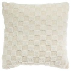 a white pillow with squares on it