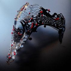 Step into the shadows and embrace the allure of darkness with our half-face laser cut metal skull masquerade mask, a masterpiece that adds an air of intrigue and mystique to your ensemble. Choose between dazzling crystals for an eerie, sparkling effect or metal studs for a rugged, edgy look—or even both! This mysterious mask will make you the star of any masquerade, themed party, gala, or other special event!


Age Group/Gender - Adult/Men

Size/Type - One size fits all adults

Mask Color - Blac Masquerade Themed Party, Skull Masquerade Mask, Half Face Masquerade Mask, Masquerade Mask Full Face, Masquerade Ball Costume, Phantom Mask, Face Laser, Masquerade Ball Masks, Masquerade Ball Mask