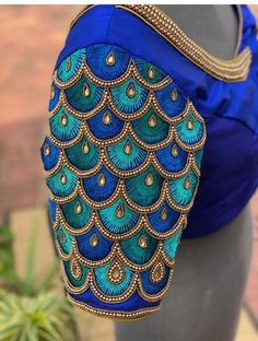 Blue Anarkali Blouse With Intricate Embroidery, Blue Bollywood Traditional Wear With Handwork, Blue Handwork Saree, Bollywood Traditional Wear With Peacock Design, Blue Traditional Wear With Handwork, Blue Handwork Saree For Wedding, Traditional Navratri Choli With Peacock Design, Blue Blouse With Intricate Embroidery For Festivals, Blue Dola Silk Blouse Piece With Intricate Embroidery