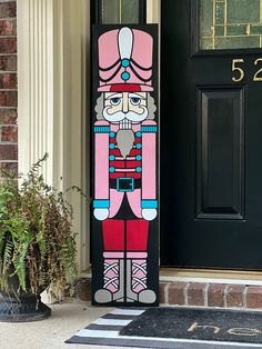 a door mat with a nutcracker painted on it