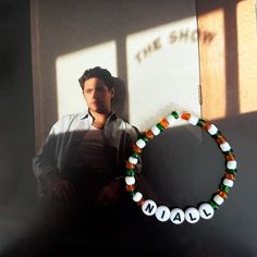 Niall Horan inspired bracelet! Made with orange, white, and green beads! All bracelets made with elastic string! Niall Bracelet, Niall Horan Outfits, Flag Bracelet, Bracelets Ideas, Irish Flag, Photos Inspo