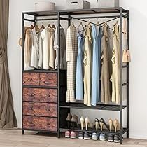 an open closet with clothes and shoes on it