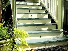 the steps are numbered with numbers on them and plants in pots next to each other