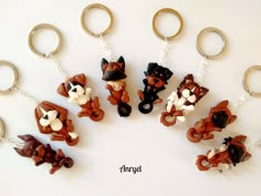 several key chains with different types of dogs on them