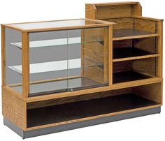 a wooden display case with glass doors and shelves