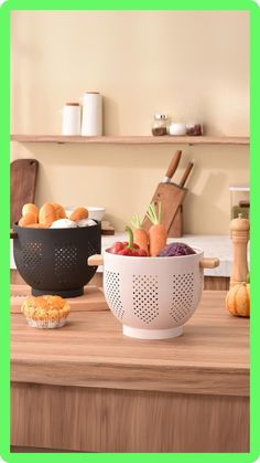 two bowls with carrots and other food in them on a wooden counter top next to a cutting board